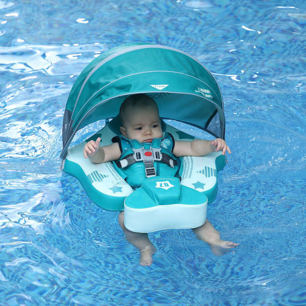 Luchtvrij babyfloat Mambobaby™ Vliegtuig Ontdekker – Drijfstoeltje met blauwgroene zonnekap en veiligheidsharnas