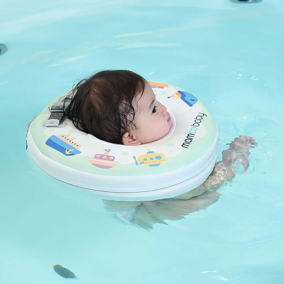 Nekring baby zonder lucht Mambobaby™ Bootjes – Groene nekring zonder lucht met harnas, gedragen door...